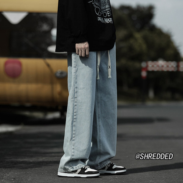 Ανδρικό στενό τζιν με κορδόνια και τσέπη