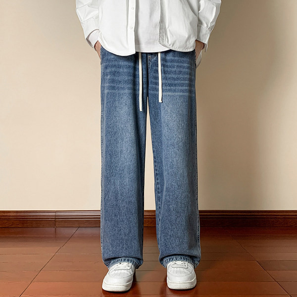 Meeste teksapükste lai paelte ja taskuga mudel