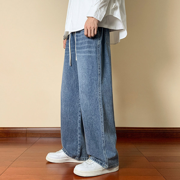 Meeste teksapükste lai paelte ja taskuga mudel