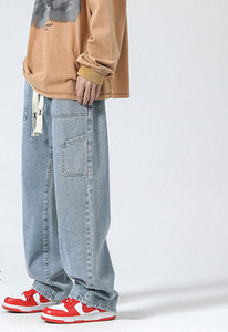 Plataus modelio vyriški džinsai su raišteliais naujas modelis