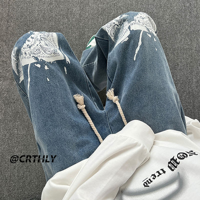 Ανδρικό τζιν φαρδύ με στάμπα