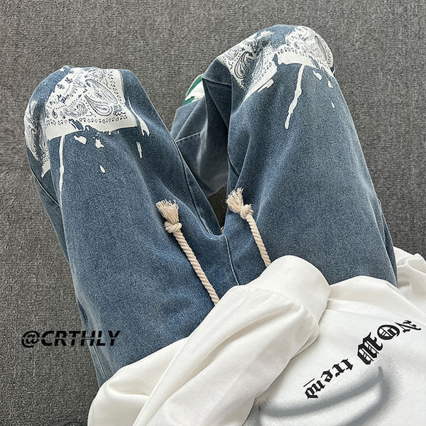 Ανδρικό τζιν φαρδύ με στάμπα