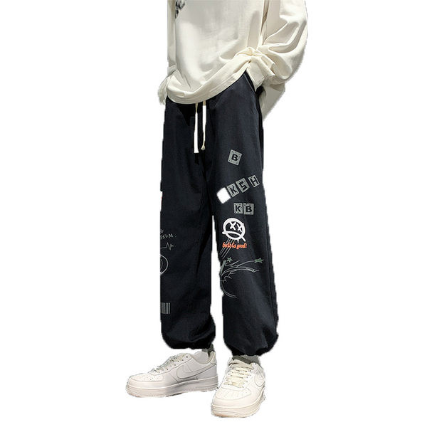 Vyriški džinsai su tampriu ir spalvingu raštu