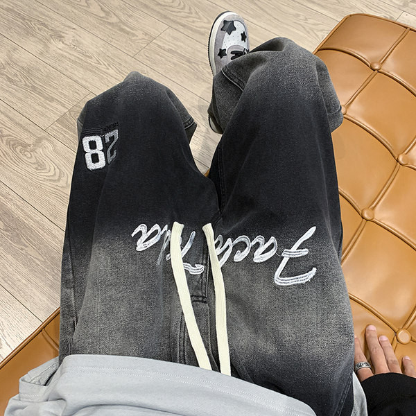 Meeste sirge mudeli teksapüksid kirja ja numbritega