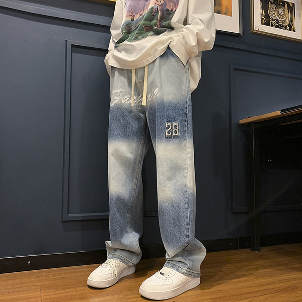 Meeste sirge mudeli teksapüksid kirja ja numbritega