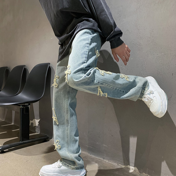 Vyriški laisvalaikio džinsai su mėlynos spalvos siuvinėjimais