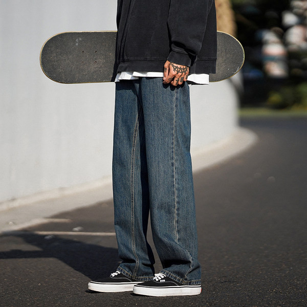 Tõmbluku ja kõrge vöökohaga meeste teksad