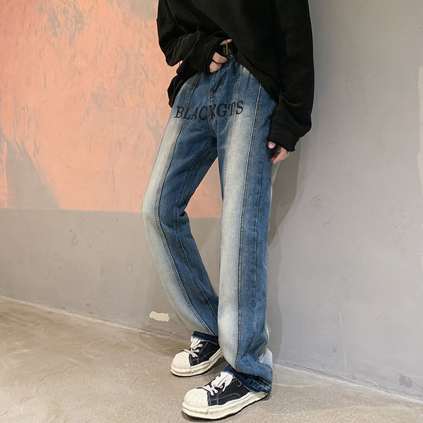 Modern, széles szárú férfi farmernadrág