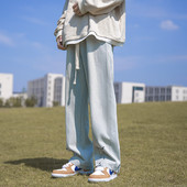 Férfi farmer széles szárral és gombokkal, felirattal