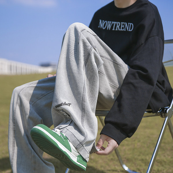 Férfi farmer széles szárral és gombokkal, felirattal