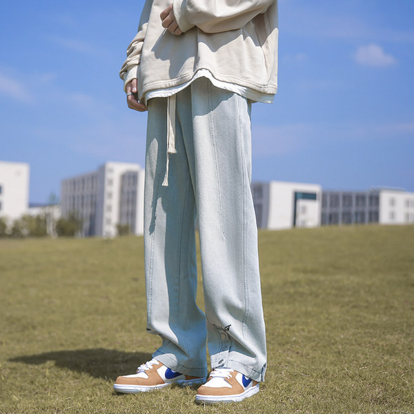 Férfi farmer széles szárral és gombokkal, felirattal