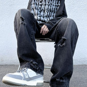 Férfi farmer fekete és barna színben, szakadt motívummal