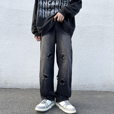 Férfi farmer fekete és barna színben, szakadt motívummal