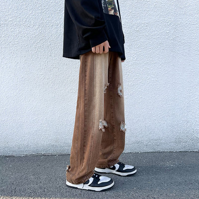 Férfi farmer fekete és barna színben, szakadt motívummal