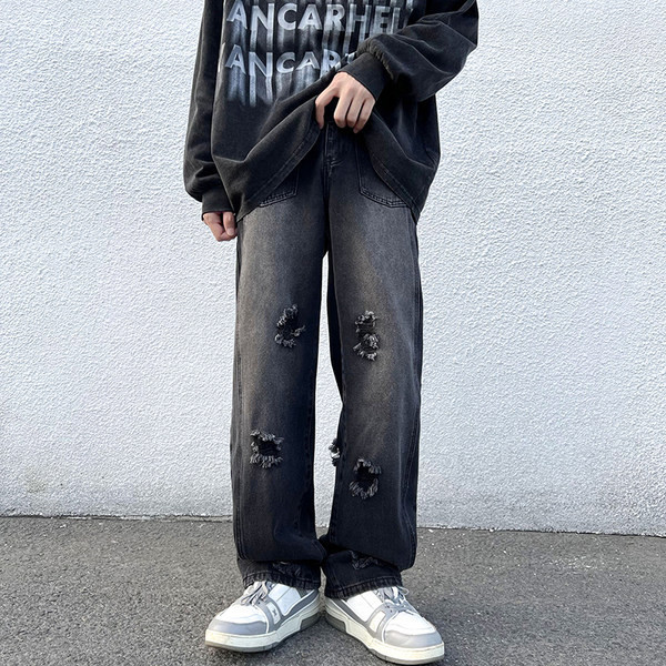 Férfi farmer fekete és barna színben, szakadt motívummal