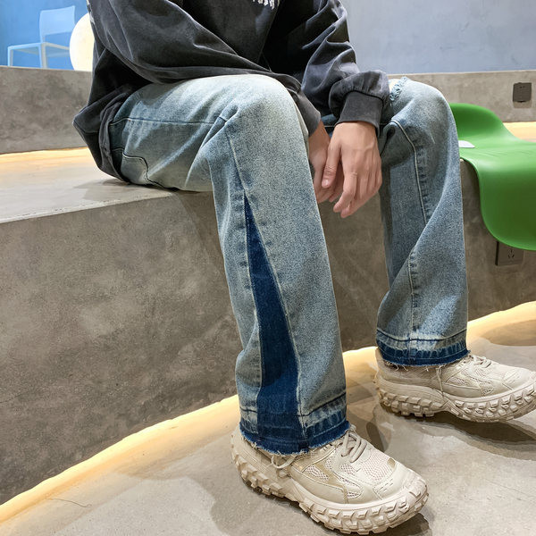 Meeste vabaaja teksad õmbluste ja rebenenud efektiga