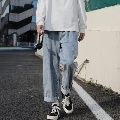 Moodsad meeste teksad üleskeeratud sääre ja nööbkinnitusega