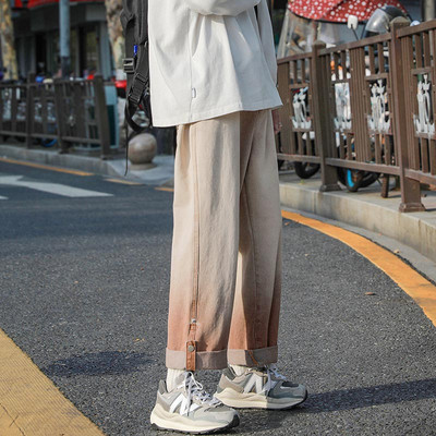 Moodsad meeste teksad üleskeeratud sääre ja nööbkinnitusega