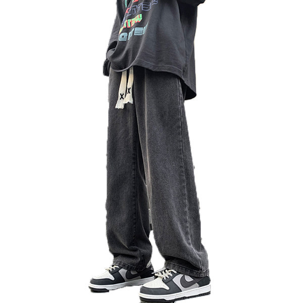 Férfi farmer zsebbel és nyakkendővel