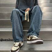 Széles szárú egyszínű farmer fűzővel férfiaknak