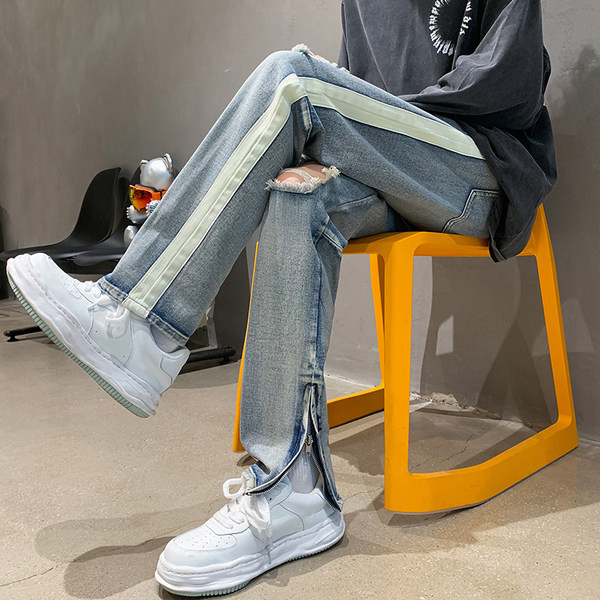 Vyriški džinsai su dekoratyviniu užtrauktuku ir karpytų motyvų