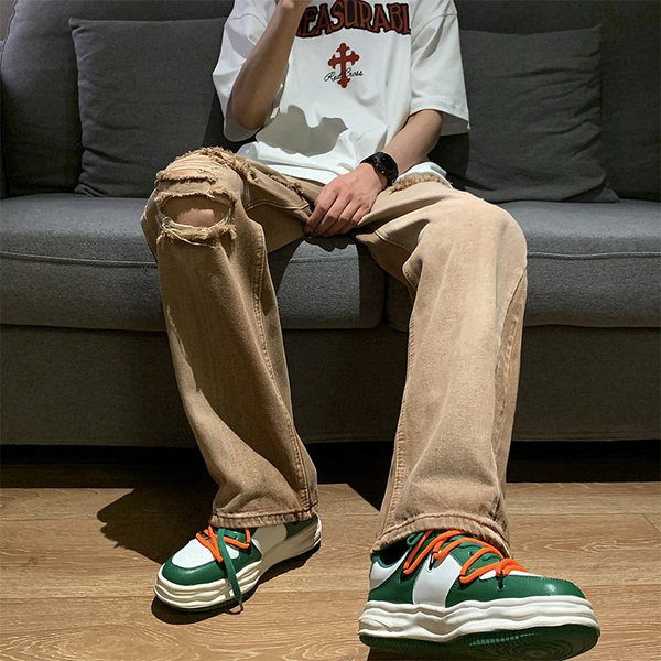 Alkalmi férfi farmernadrág zsebbel, szakadt hatású