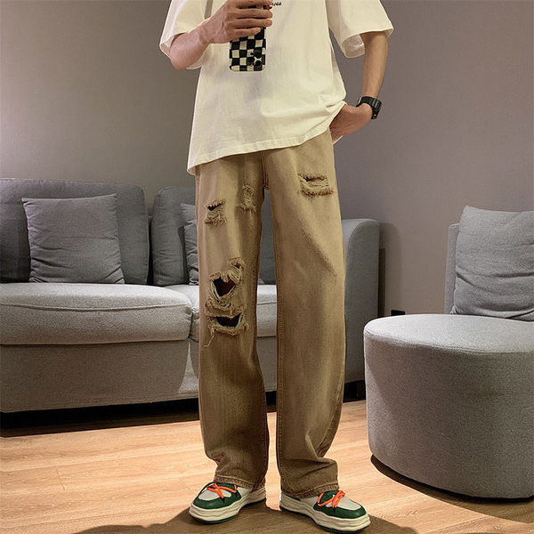 Alkalmi férfi farmernadrág zsebbel, szakadt hatású