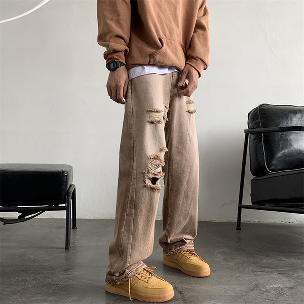 Alkalmi férfi farmernadrág zsebbel, szakadt hatású