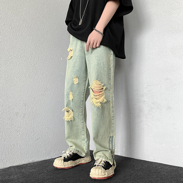 Dviejų spalvų vyriški džinsai su kirptais motyvais