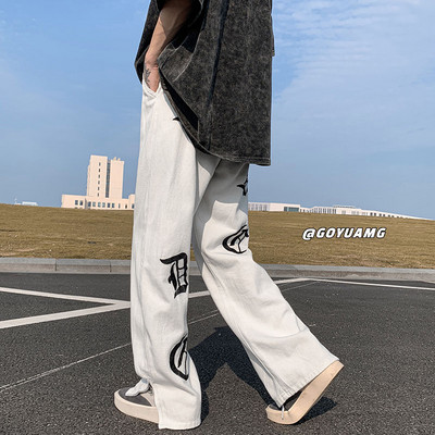 Vyriški juodai balti džinsai su užtrauktuku ir raštu