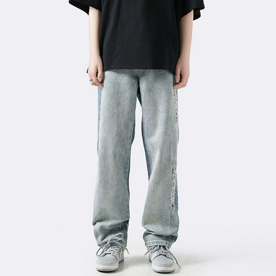 Ανδρικό φαρδύ τζιν με σκισμένα μοτίβα