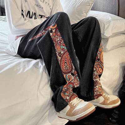 Uus mudel lillelise kaunistusega meeste teksapüksid