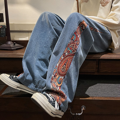 Uus mudel lillelise kaunistusega meeste teksapüksid