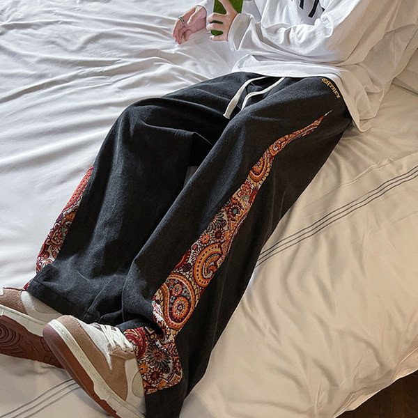 Uus mudel lillelise kaunistusega meeste teksapüksid