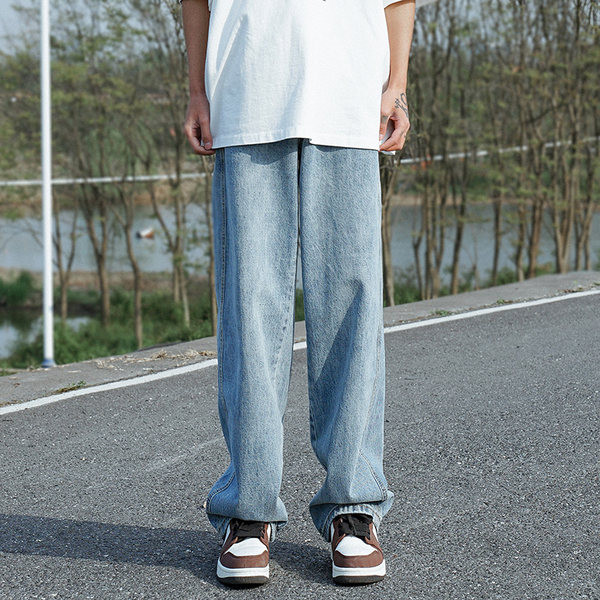 Férfi alkalmi farmernadrág zsebbel és széles szárral