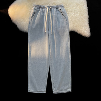 Heledat ja tumedat värvi meeste teksad taskutega