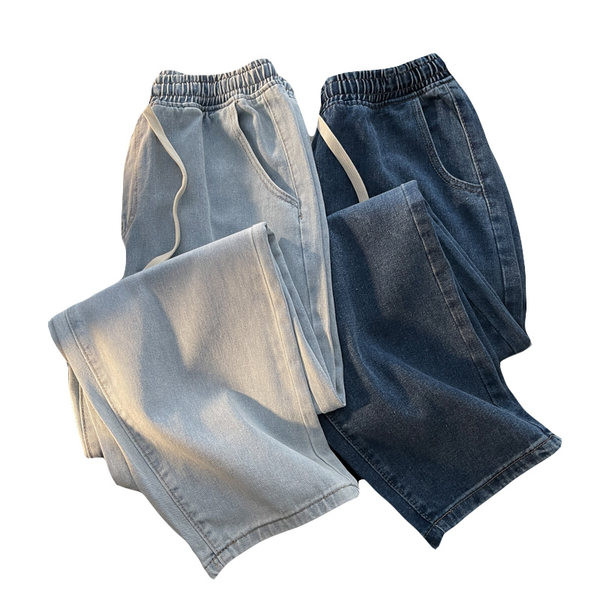 Heledat ja tumedat värvi meeste teksad taskutega