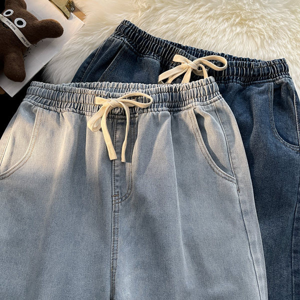 Heledat ja tumedat värvi meeste teksad taskutega