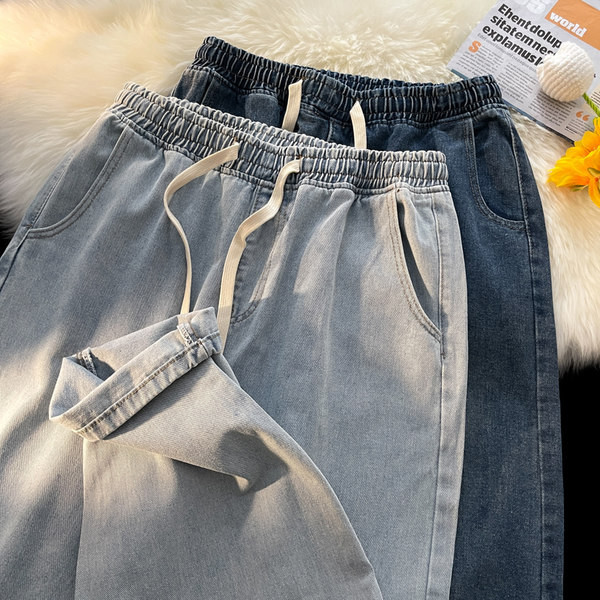 Heledat ja tumedat värvi meeste teksad taskutega