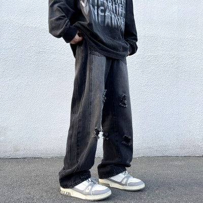 Meeste vabaaja rebenenud mustriga taskuteksad