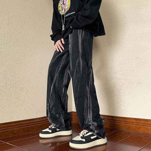 Fekete színű férfi farmer fehér motívummal és zsebbel