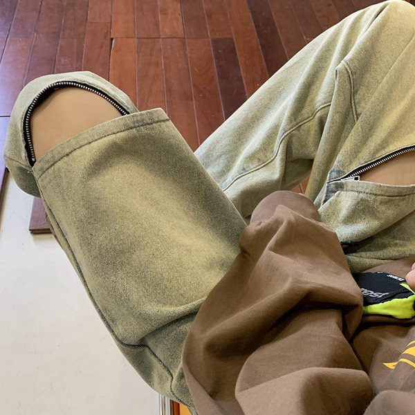 Új férfi farmer modell, szakadt motívumokkal és dekoratív cipzárral