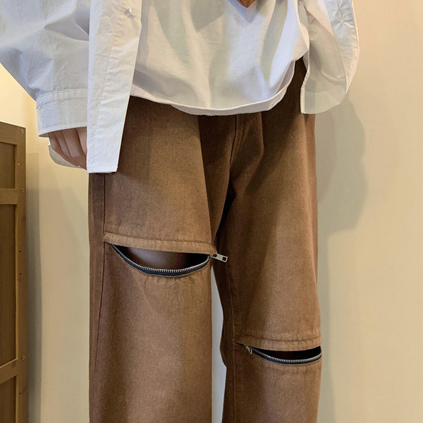 Új férfi farmer modell, szakadt motívumokkal és dekoratív cipzárral