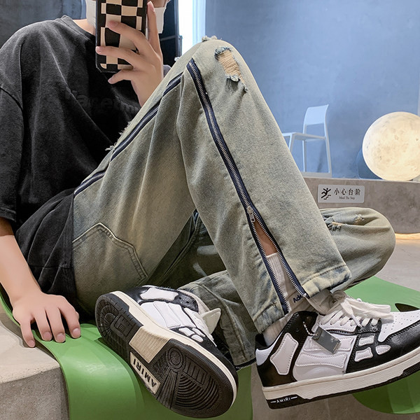 Stiilsed meeste teksad küljetõmbluku ja rebitud motiividega