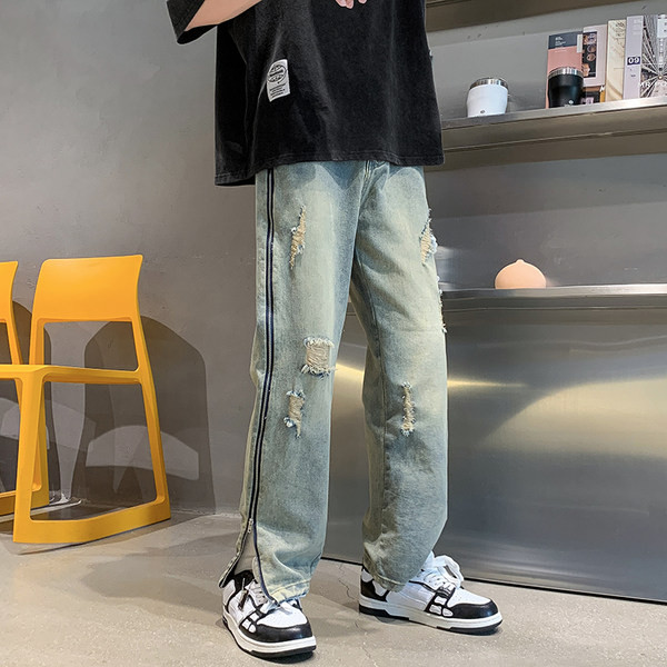 Stiilsed meeste teksad küljetõmbluku ja rebitud motiividega