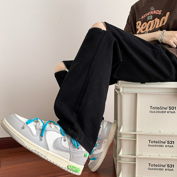 Férfi farmer egyenes modell zsebbel és cipzárral a térdén