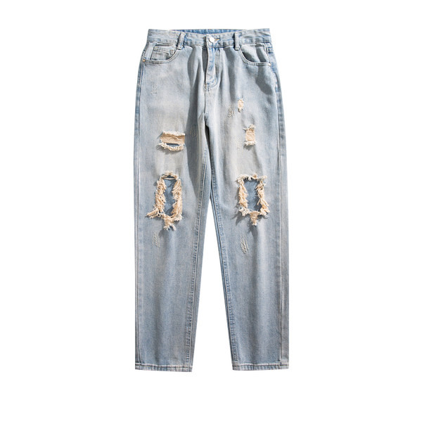 Meeste sirge säärega teksapüksid, millel on rebitud motiivid ja tasku