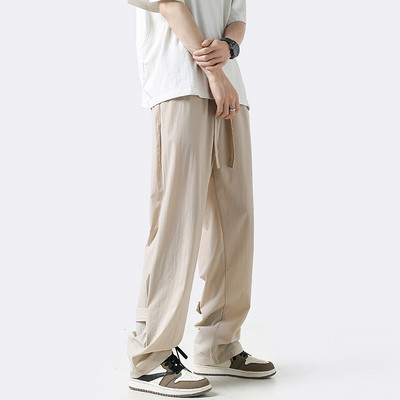 Férfi farmer zsebbel és nyakkendővel