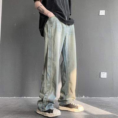 Ανδρικό τζιν φαρδύ μοντέλο με τσέπη και μεταλλικά πριτσίνια