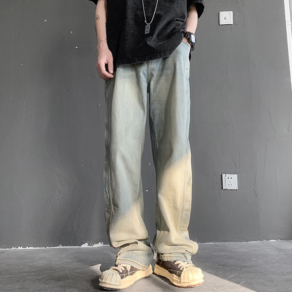 Ανδρικό τζιν φαρδύ μοντέλο με τσέπη και μεταλλικά πριτσίνια